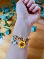 Pulsera charms floral girasol y abeja ajustable