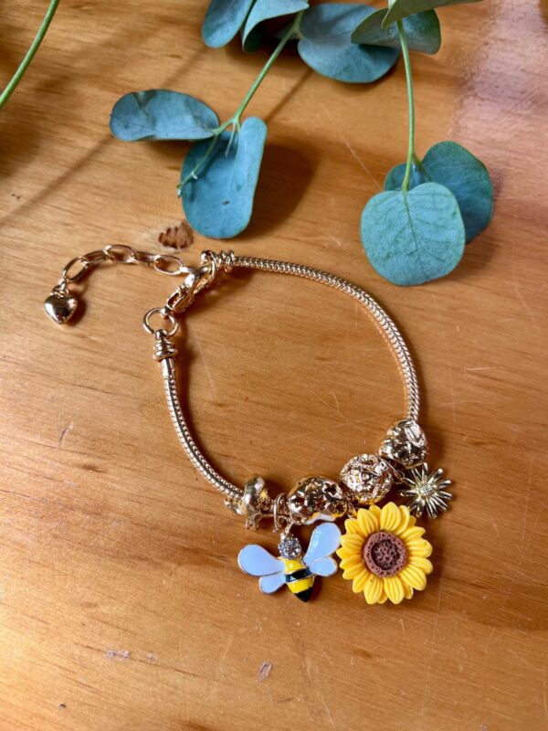 Pulsera charms floral girasol y abeja ajustable