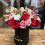 Caja redonda mix rojo y rosado + Ferrero Rocher - Floreria Encactus Vina del Mar